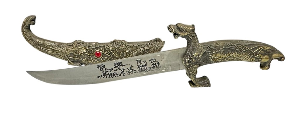 decorative dagger knife with red stone