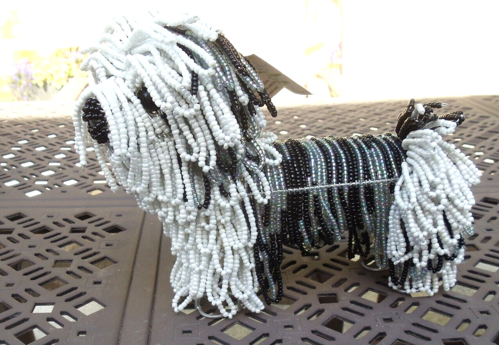 Beaded land:  Long-haired Shih Tzu