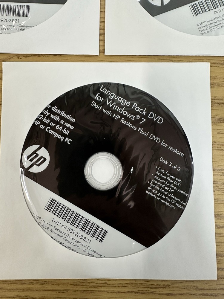 HP Restore Plus! Microsoft Windows 7 Professional Recovery DVD'S (3)