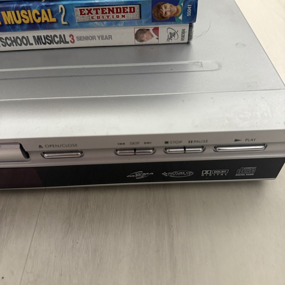 Koss DVD / CD / MP3 Player KD365 with Sealed DVD Bundle