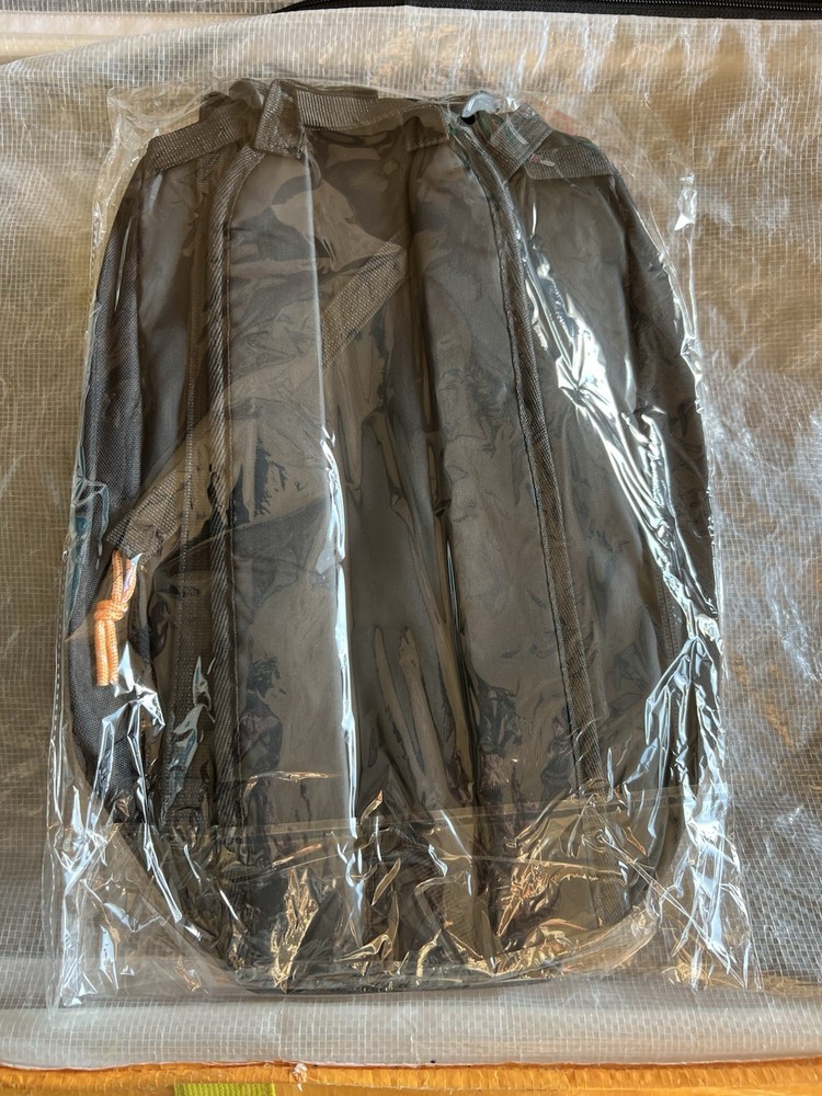 Black Tactical Backpack for Kids in Plastic Packaging with Barcode