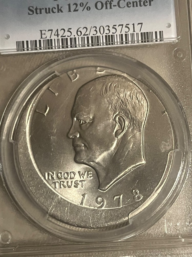 1978 Ike dollar Mint Error , Off center , Brilliant uncirculated PCGS MS62