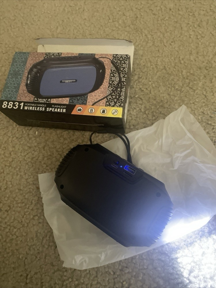 Portable Wireless Bluetooth Speaker And Flashlight Model 8831