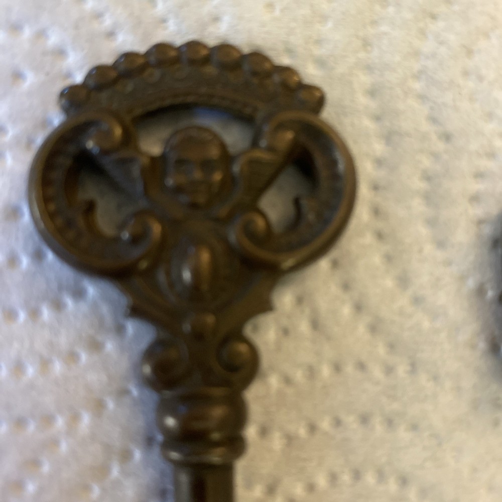 Victorian cherub & Art Deco keys