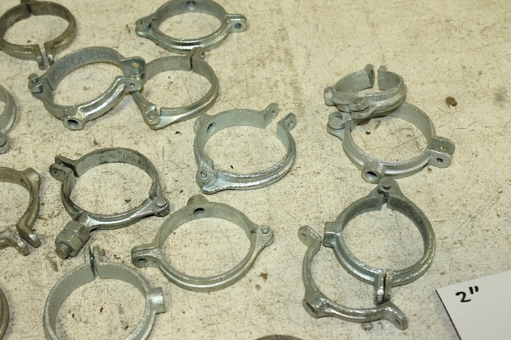 A lot of 2" Galvanized Split Ring Pipe Hangers