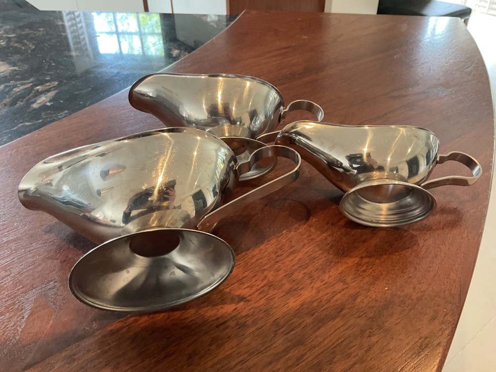 THREE SILVER COLOUR SAUCE BOATS GRADUATED