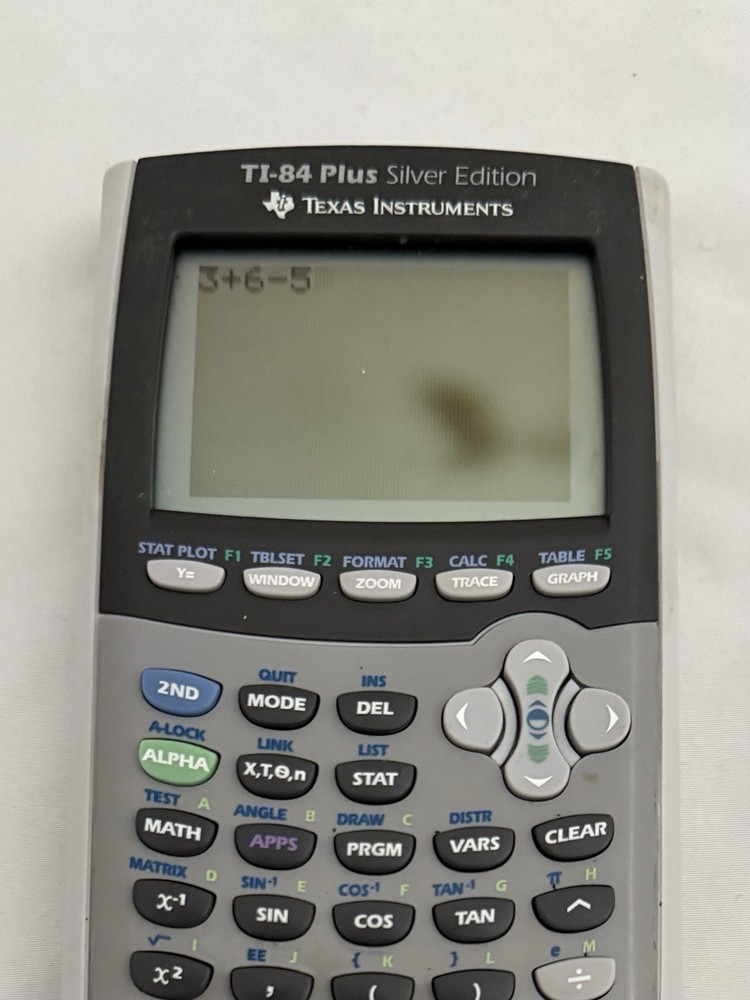 Texas Instruments TI-84 Plus Silver Edition Graphing Calculator Screen Blemish