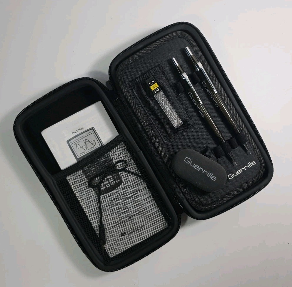 Texas Instruments TI-83 Plus Graphing Calculator w/ Guerrilla Case/Accessories