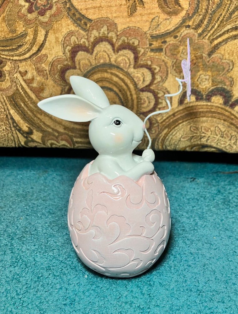 porcelain Bunny in Easter Egg holding butterfly