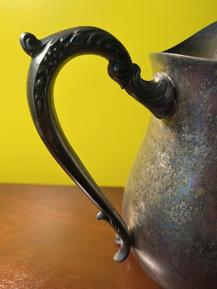 vintage silver soldered pitcher 9” tall