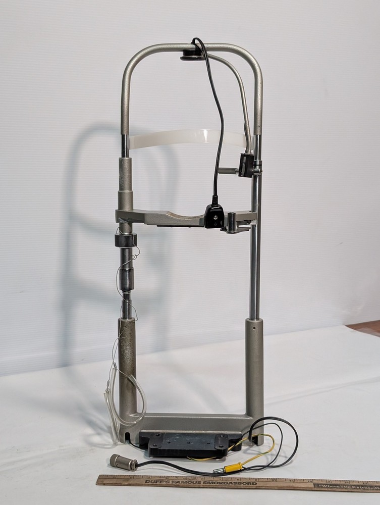 Optometry patient eye exam chin head rest and forehead bracket mount assembly