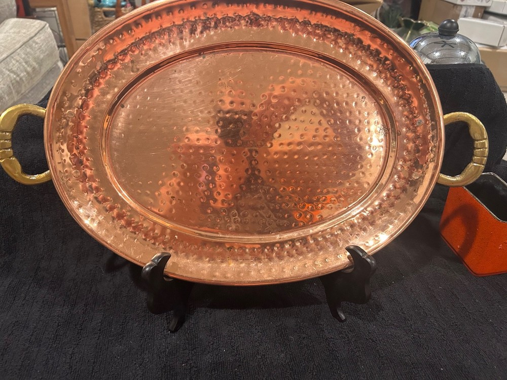 hammered copper oval serving tray with brass colored handles