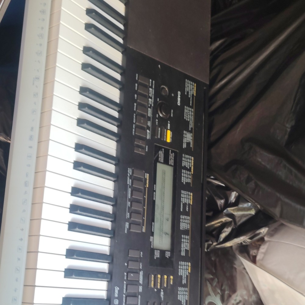 Casio WK-240 76-Key Electronic Keyboard Built-in Speaker LCD Display
