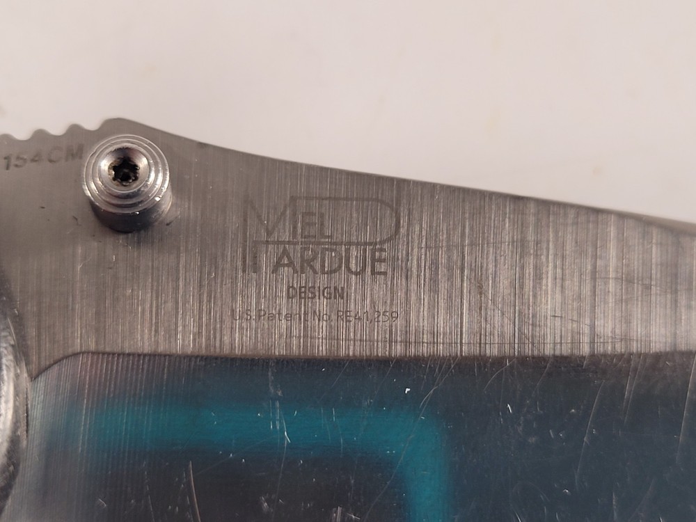 BenchmadeMini Griptilian Black Grivory Drop-point Folding Knife