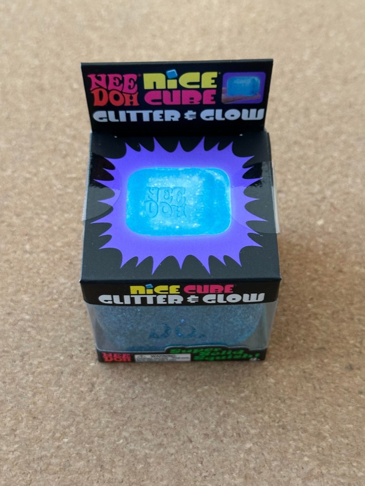Schylling NEEDOH NICE CUBE GLITTER and GLOW Super Solid Squish Toy - BLUE