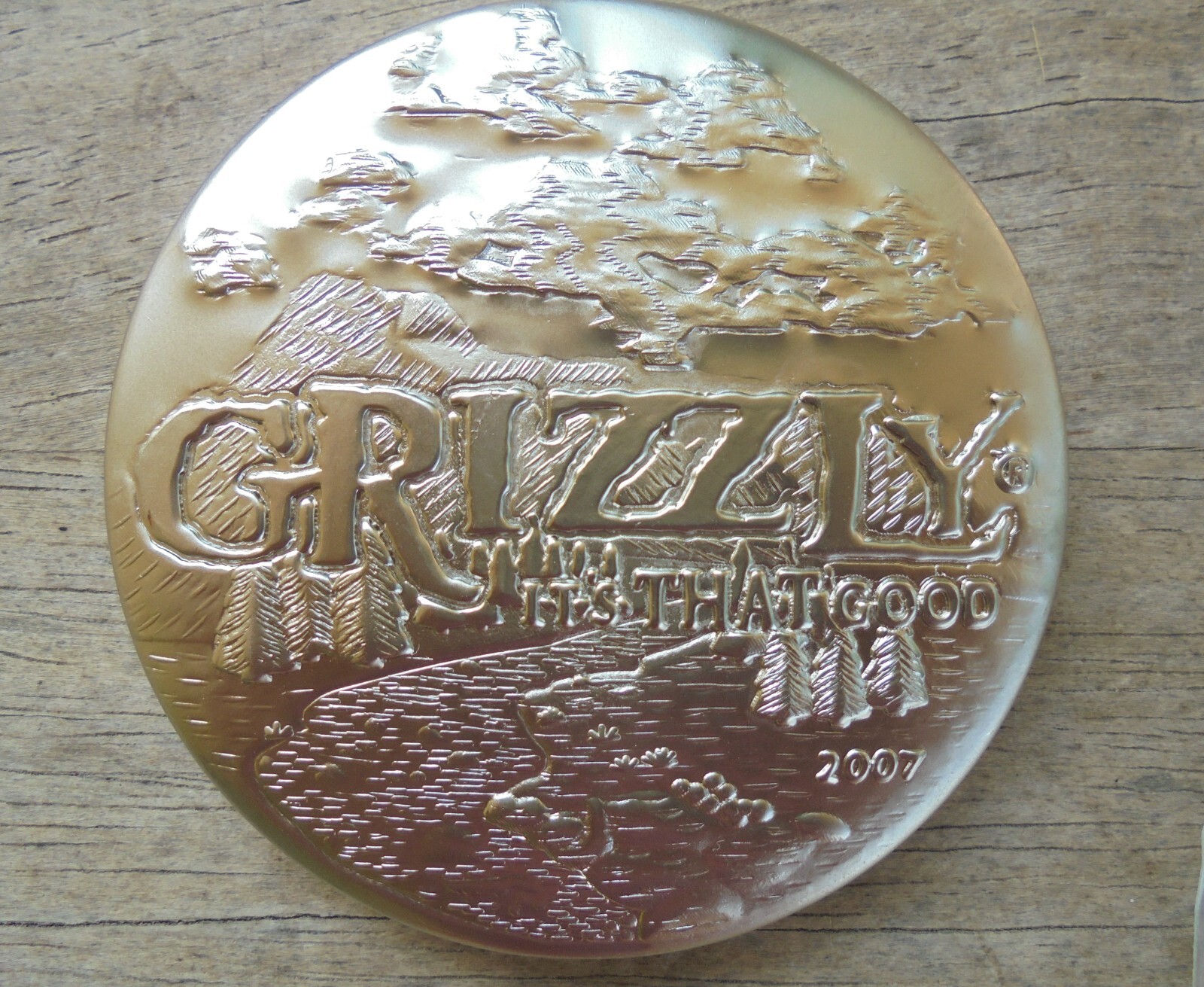 2007 Grizzly Premium Metal Snuff Can Lid "IT's THAT GOOD"-new/unused