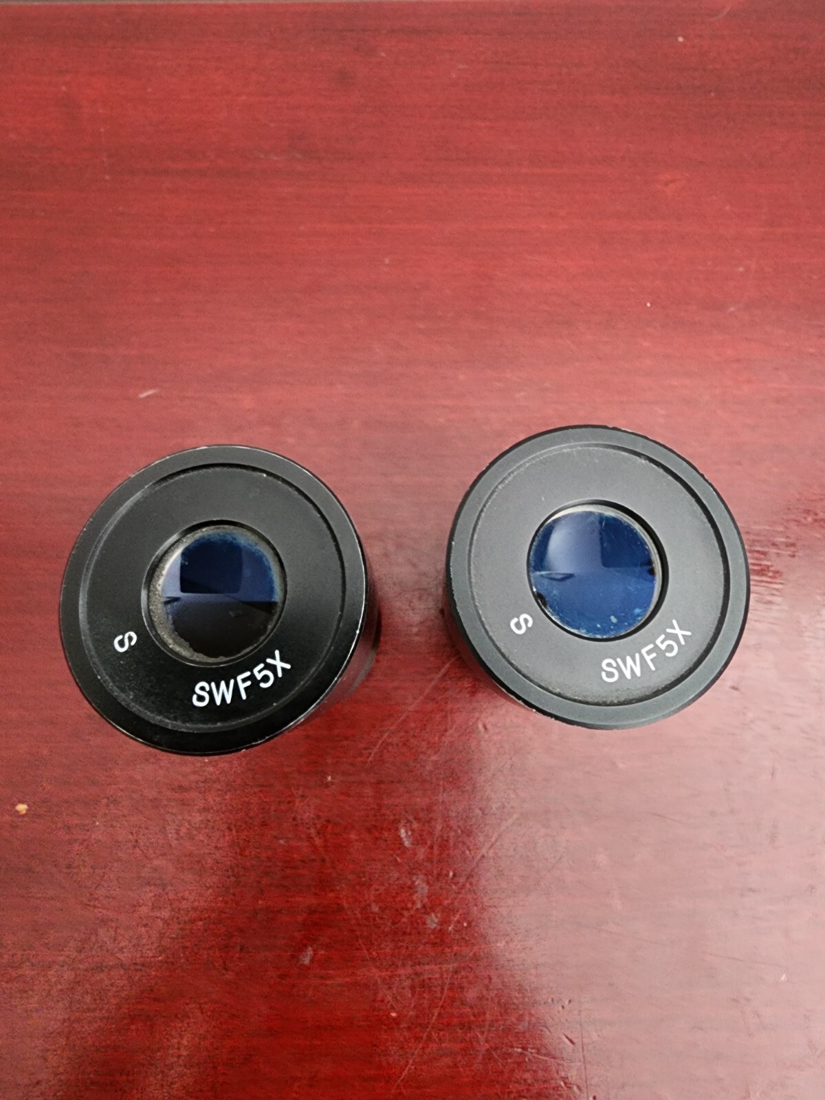 PAIR(2) OF S SWF5X MICROSCOPE EYEPIECES. NO CRACKS OR CHIPS. WORKS