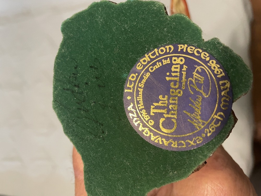 signed dragon figure