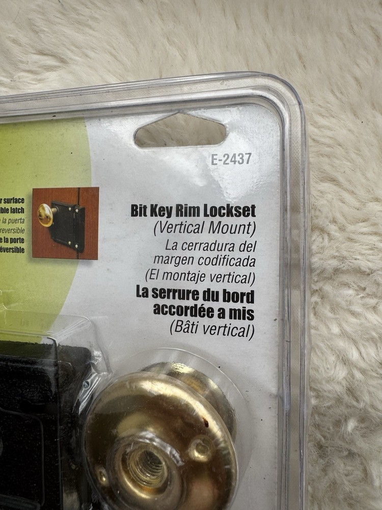Defender Security Brass/Black Bit Key Rim Lockset, Vertical Style, E-2437