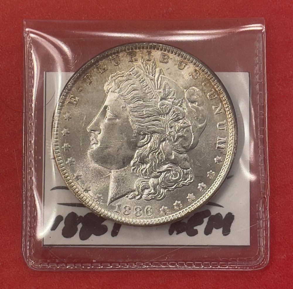 1886 P Morgan Silver Dollar, Gem Uncirculated.