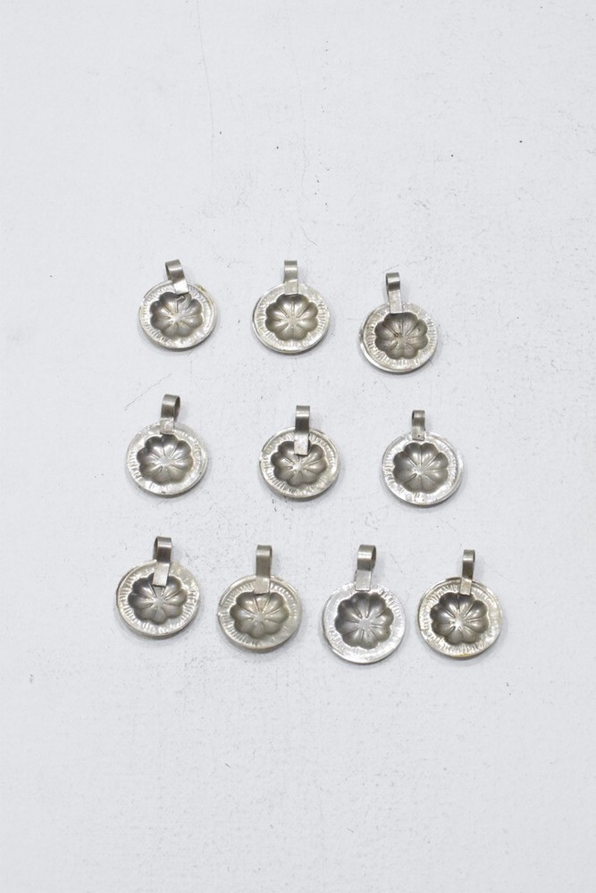 Middle Eastern Stamped Silver Flower Pendants
