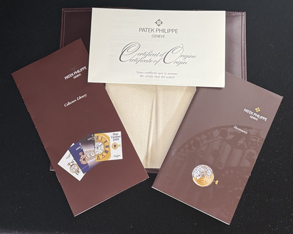 PATEK PHILIPPE LEATHER FOLDER with CERTIFICATE & MOVEMENTS BOOKLET & PAMPHLET