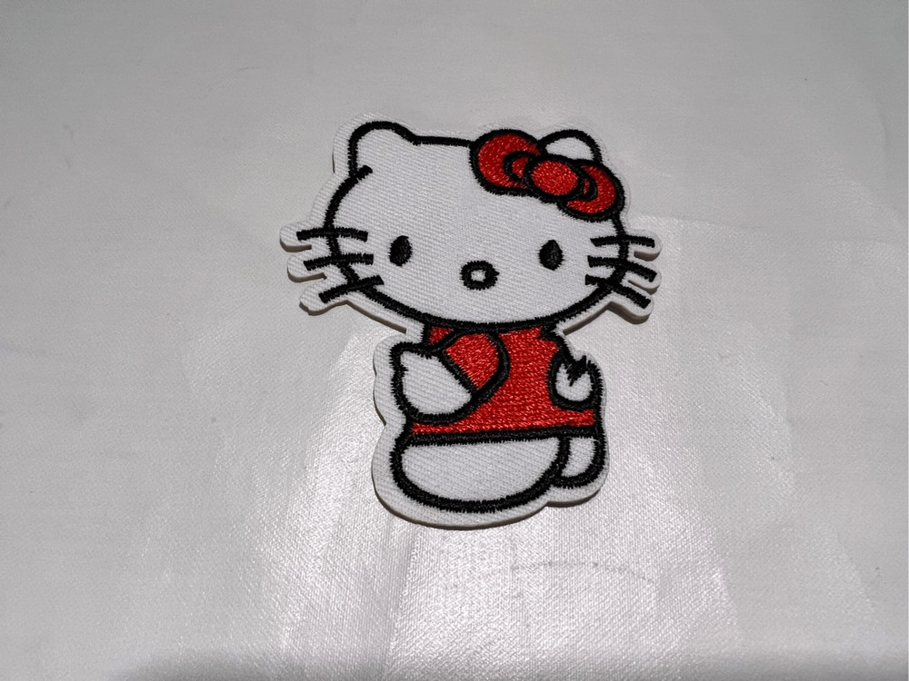 Hello Kitty Looking Over Shoulder Iron on Patch