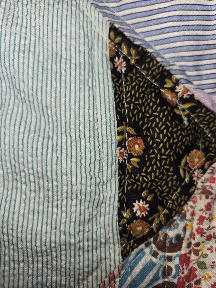 QUILT. 78X96. MACHINE QUILTED. 100 DIFFERENT PATTERNS