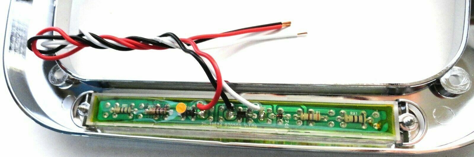 headlight bezel 6x8 clear lens amber LED chrome plastic visor for Peterbilt each