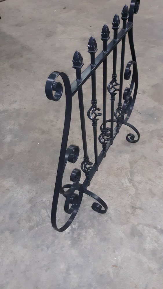 DECORATIVE ROUT IRON . FIREPLACE SCREEN