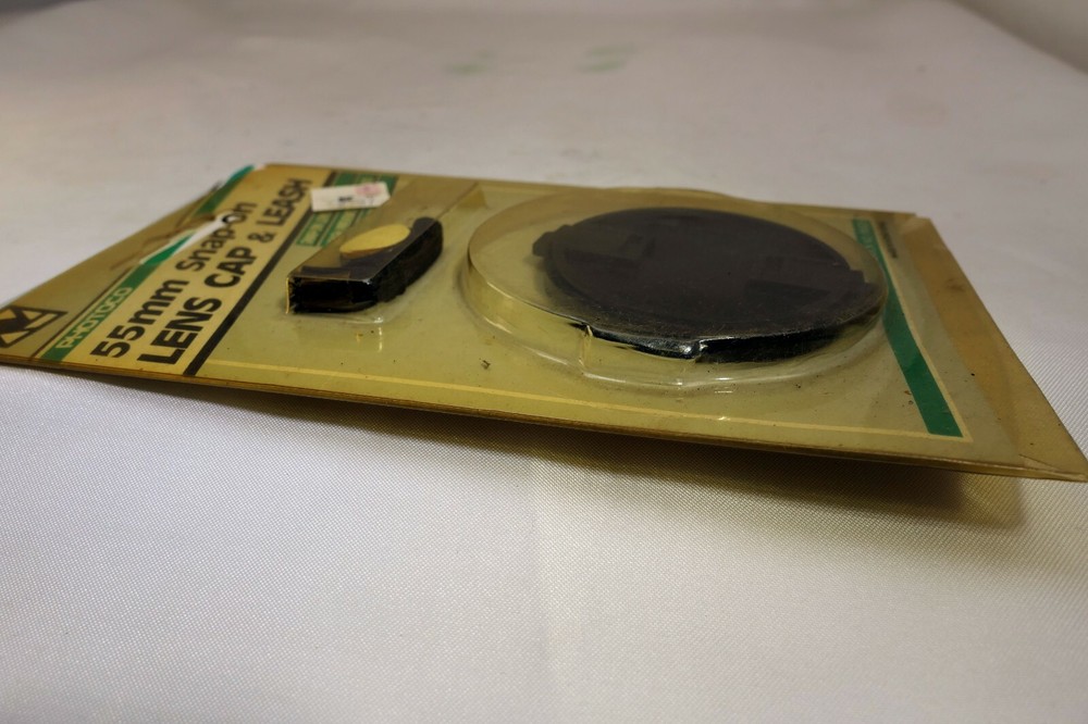 55mm Front Lens Cap snap on type with leach keeper string P55CH