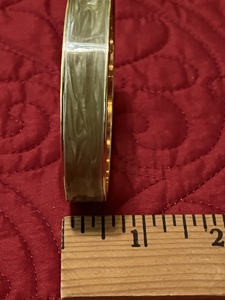 MONET LIGHT GREEN BANGLE BRACELET 2 1/2 DIAMETER.SIGNED.