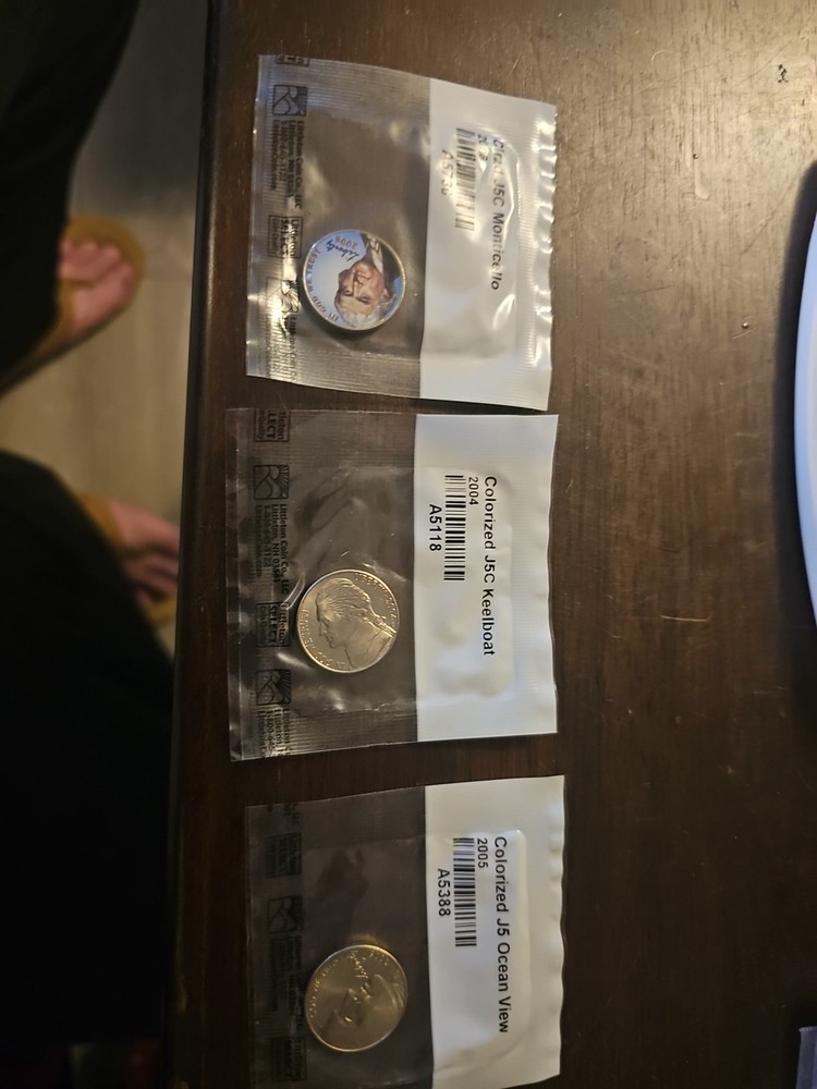 Three Colorized Coins