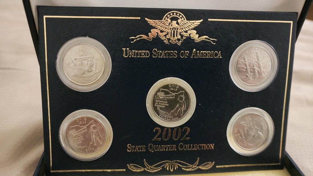 Coins uncirculated 5 piece 2002 Quater set