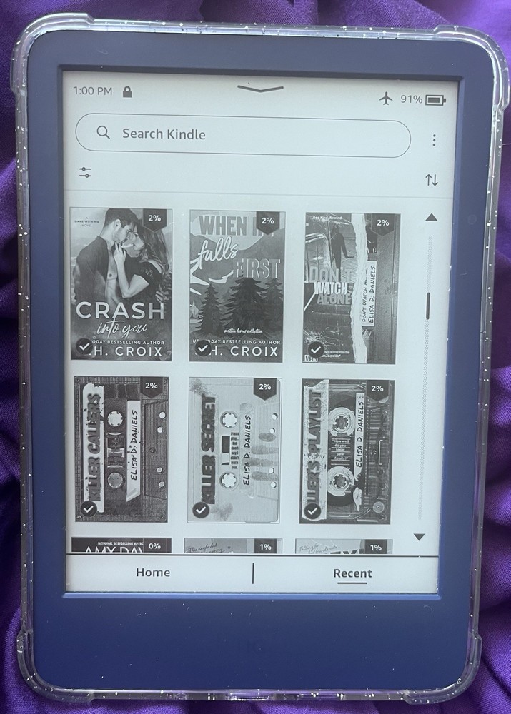 Amazon Kindle ereader Blue with books