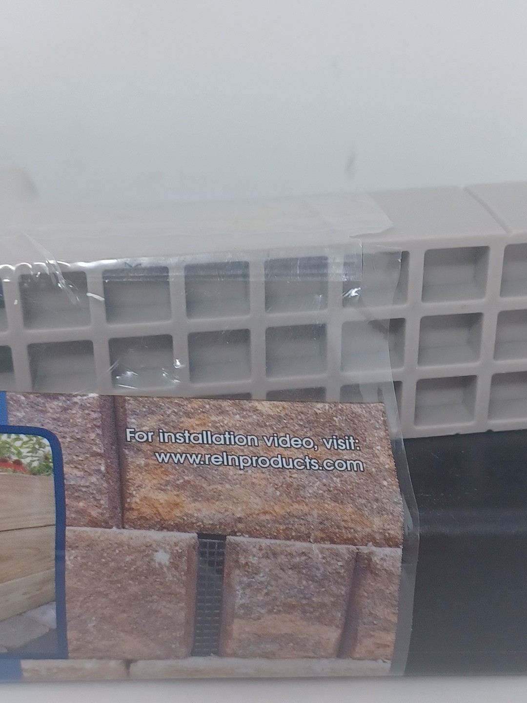 Reln Wall Drain 4 in. x 14 in. Universal Retaining Wall Block Channel Drain Gray