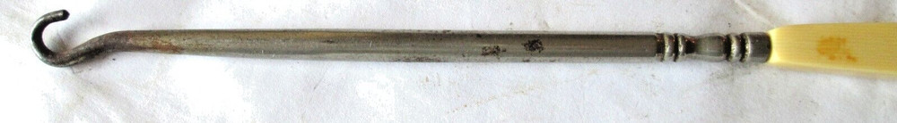 ANTIQUE YELLOW HANDLE, NICKEL PLATED IRON BUTTON HOOK, 8 1/4", USED