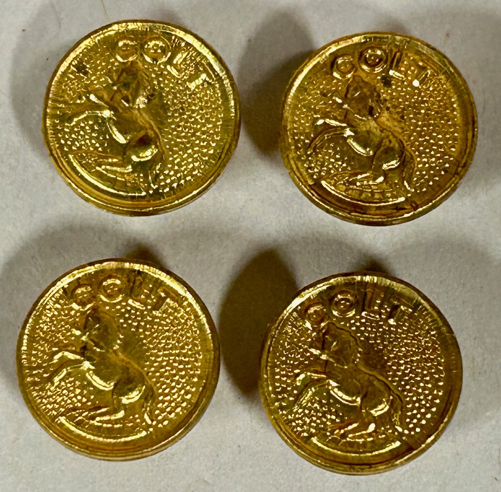 Lot Of "4" UNUSED Colt 1911 Gold Tone Pistol Grip Medallions (A4)