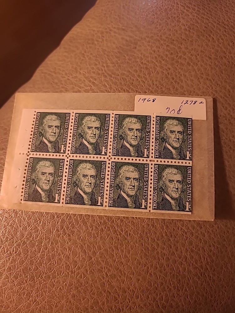 EIGHT 1 CENT STAMPS