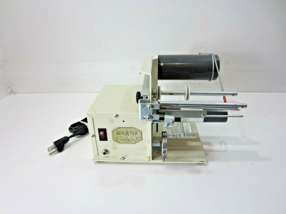 Grip-A-Tab Electric Tape Dispenser Machine