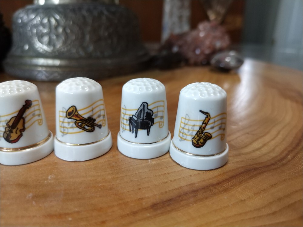 7 vintage ceramic musical instruments thimbles
