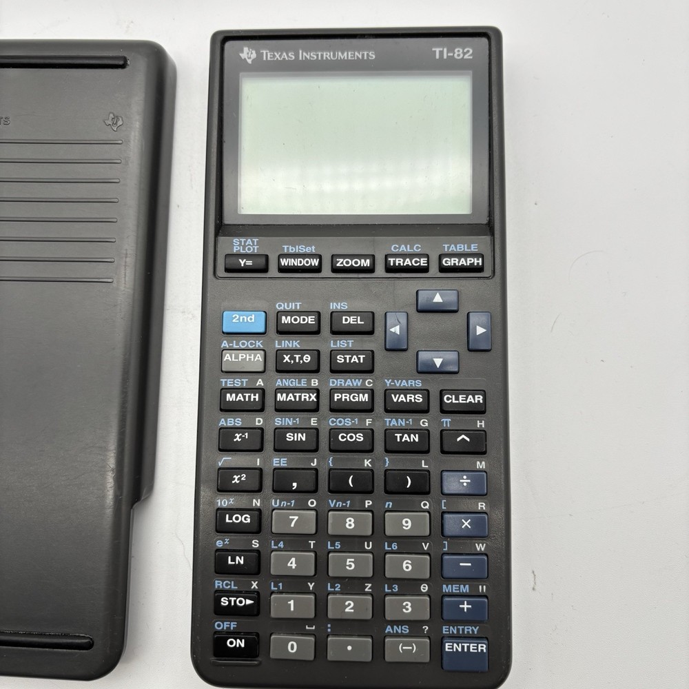 Texas Instruments TI-82 Graphing Calculator Tested Works.