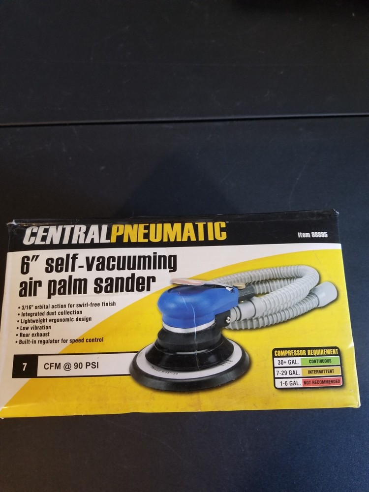 Self Vacuuming Air Palm Sander.
