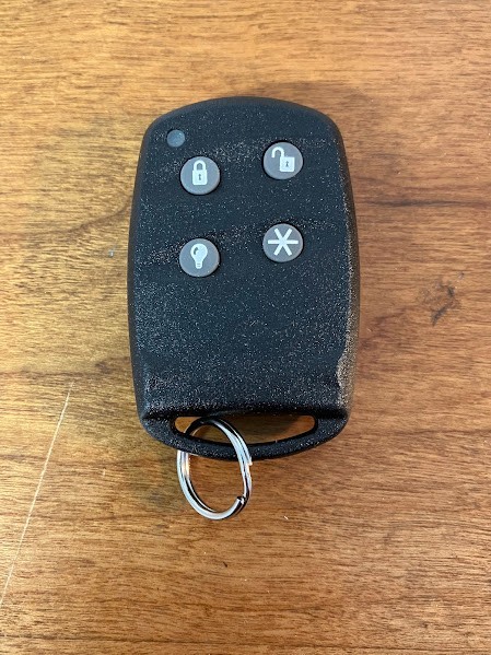 Interlogix: Four Button Crystal Keychain Touchpad - 60-607-319.5