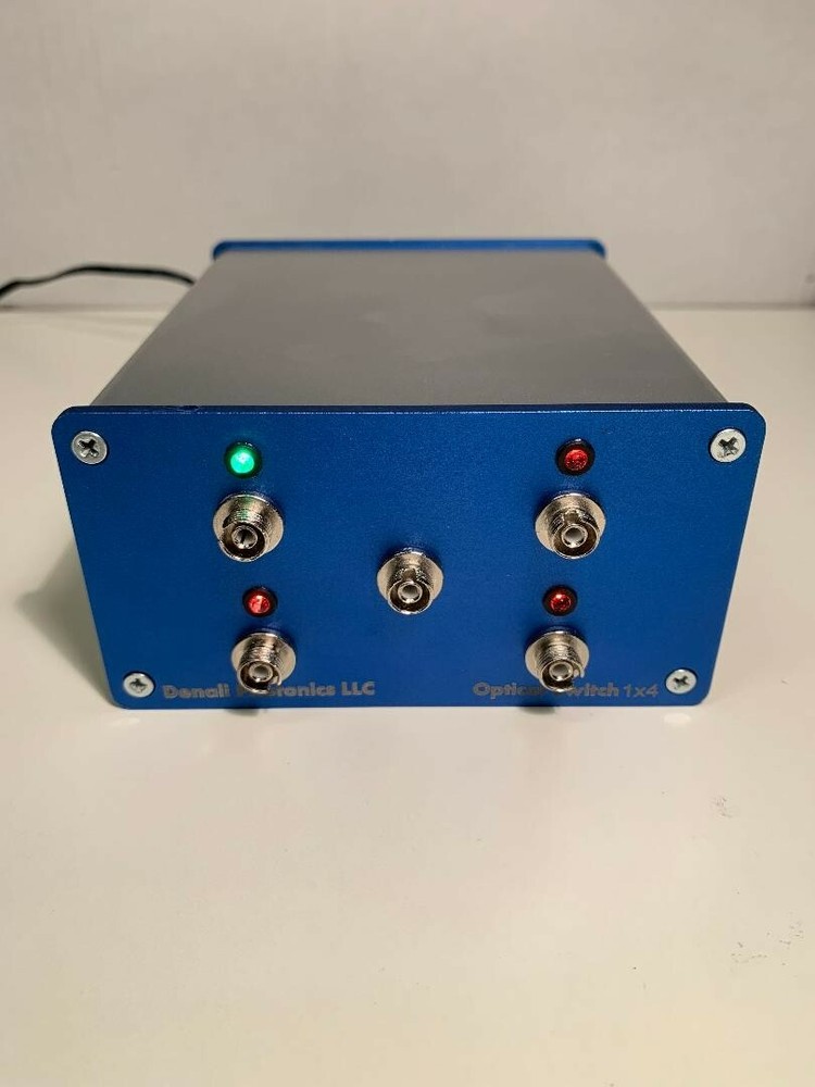 Remotely programmable fiber optical switch