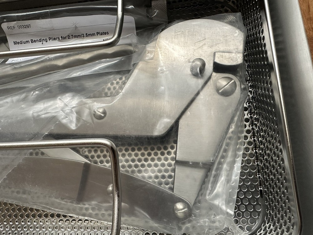 Everost Medium and Large Bending Pliers in V. Mueller CD0-4C Sterilization Case