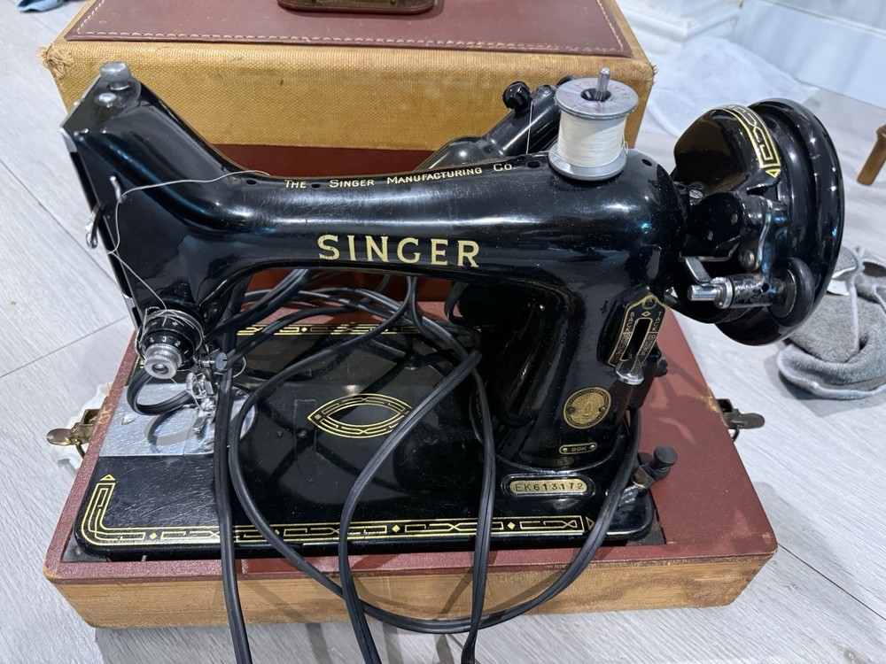 This is a vintage Singer Sewing Machine