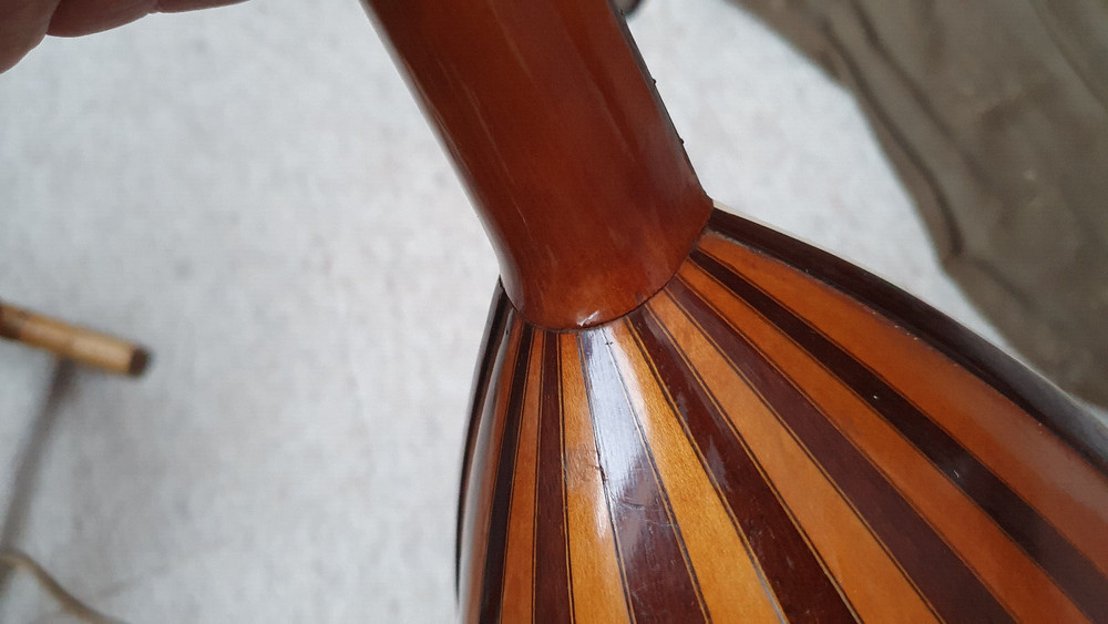 Nice old mandolin w. a nicely inlayed windmil, needs repair