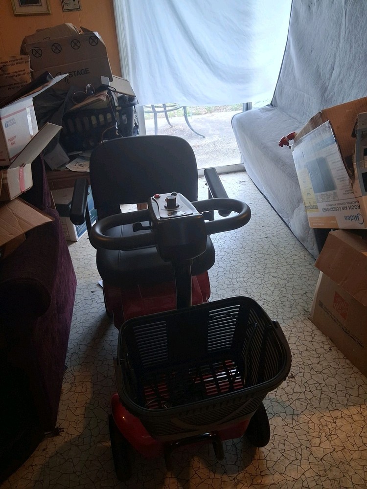 Red Mobility Scooter.
