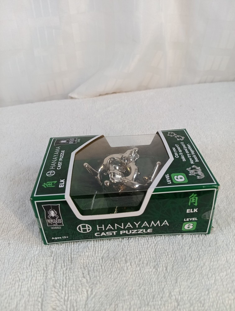 Hanayama Cast Puzzle Model: "ELK" Level: 6